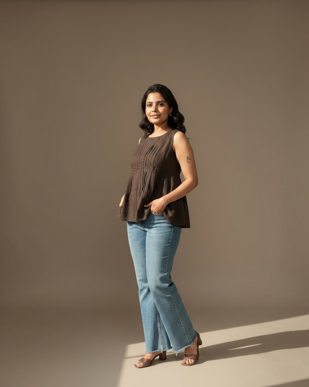Mocha Pintuck Peplum Top – Front close-up